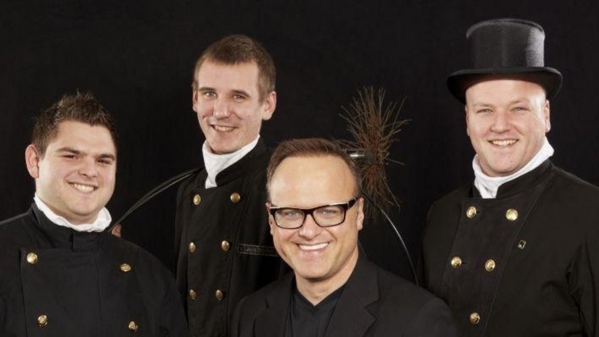 Schornsteinfeger Kopf und sein Team Bild vom Schornsteinfeger Kopf und sein Team